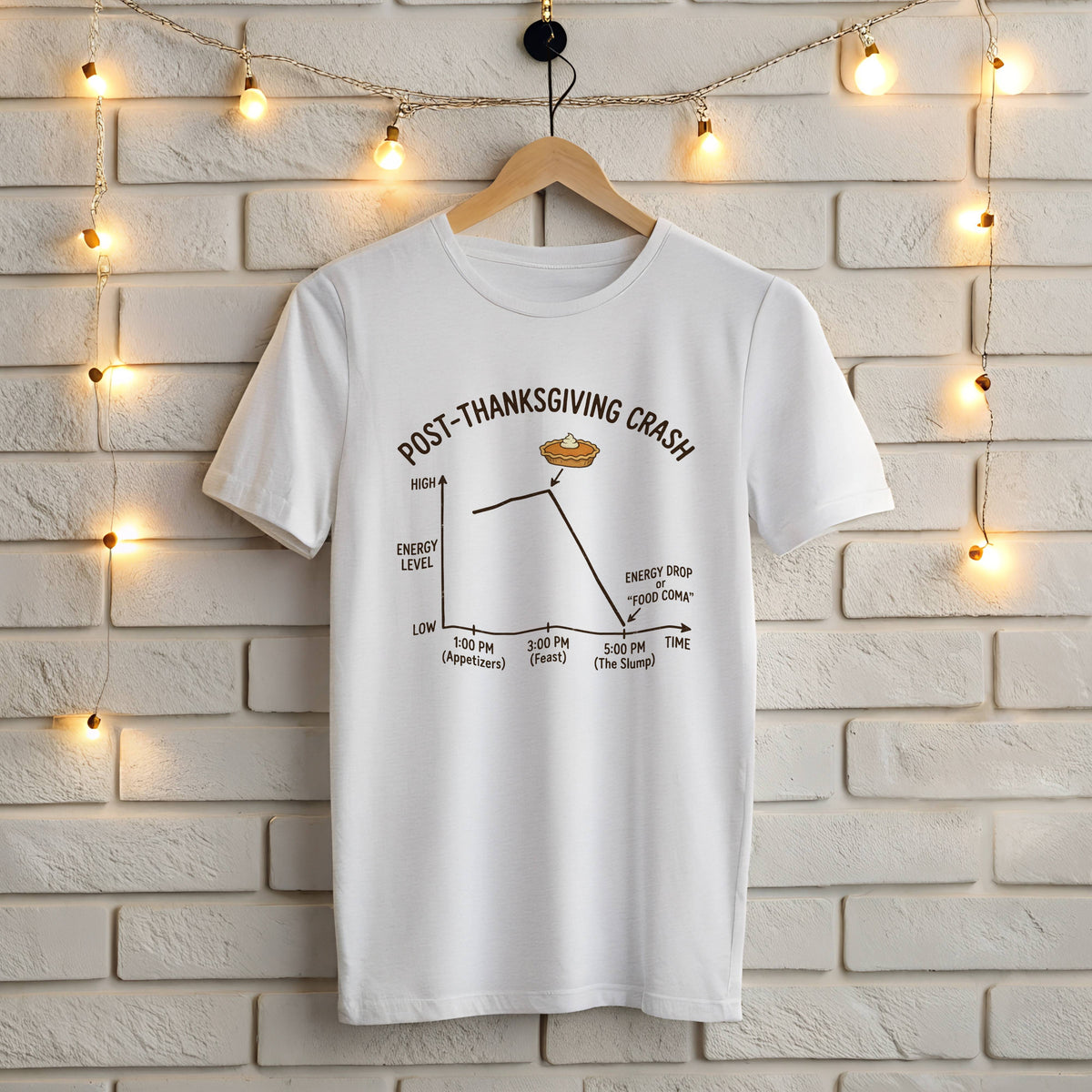 White Gildan 5000 t-shirt with funny Post-Thanksgiving Crash energy level graph and pumpkin pie design