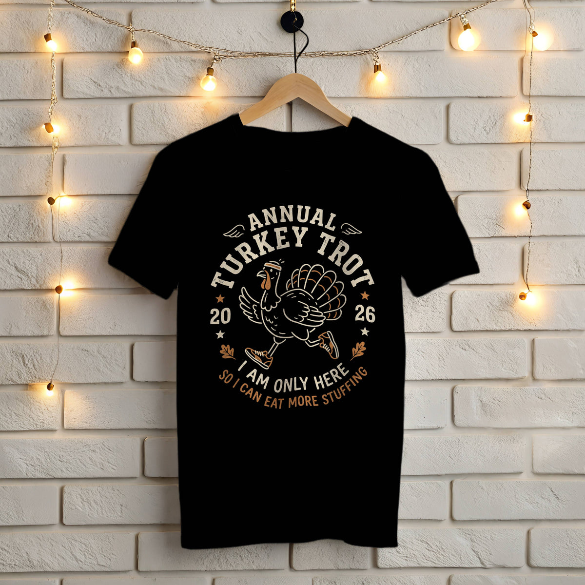 Black Gildan 5000 t-shirt with funny Annual Turkey Trot 2026 design of a running turkey in sneakers, I am only here so I can eat more stuffing