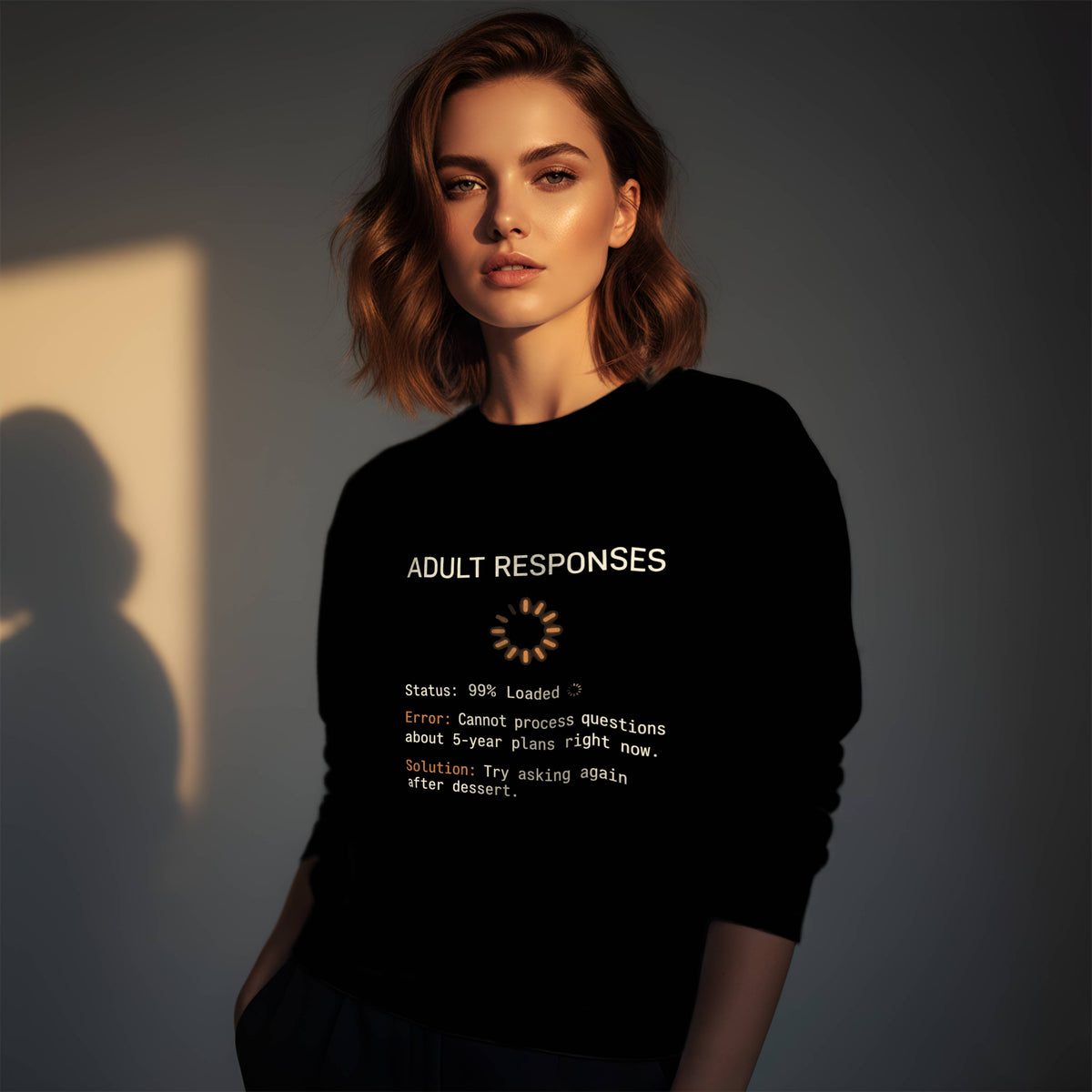 Woman wearing a black Gildan 18000 crewneck sweatshirt with funny Thanksgiving Adult Responses loading screen design, try asking again after dessert