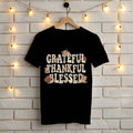 Black Gildan 5000 t-shirt with cute retro Grateful Thankful Blessed Thanksgiving design with kittens and a turkey