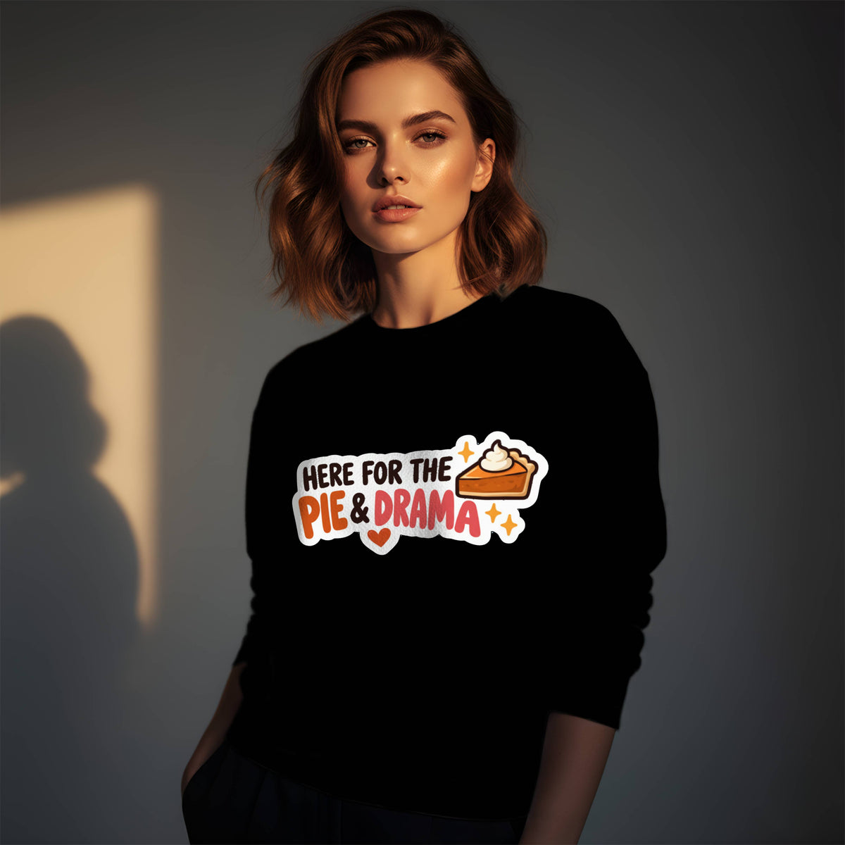 Woman wearing a black Gildan 18000 crewneck sweatshirt with funny Thanksgiving Here for the Pie & Drama design and pumpkin pie slice